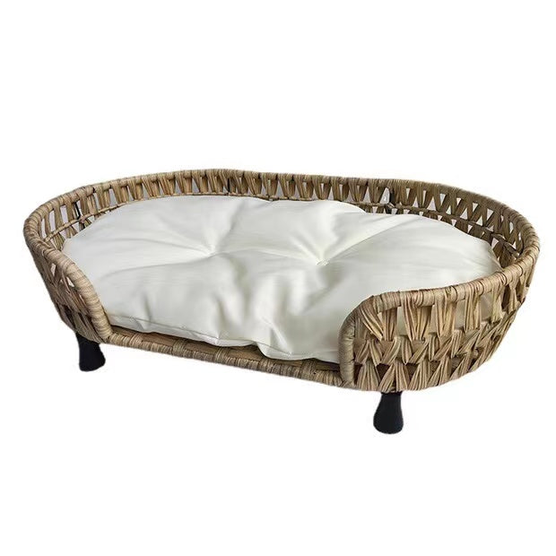 rattan-weaved oval pet bed with pp cotton mat